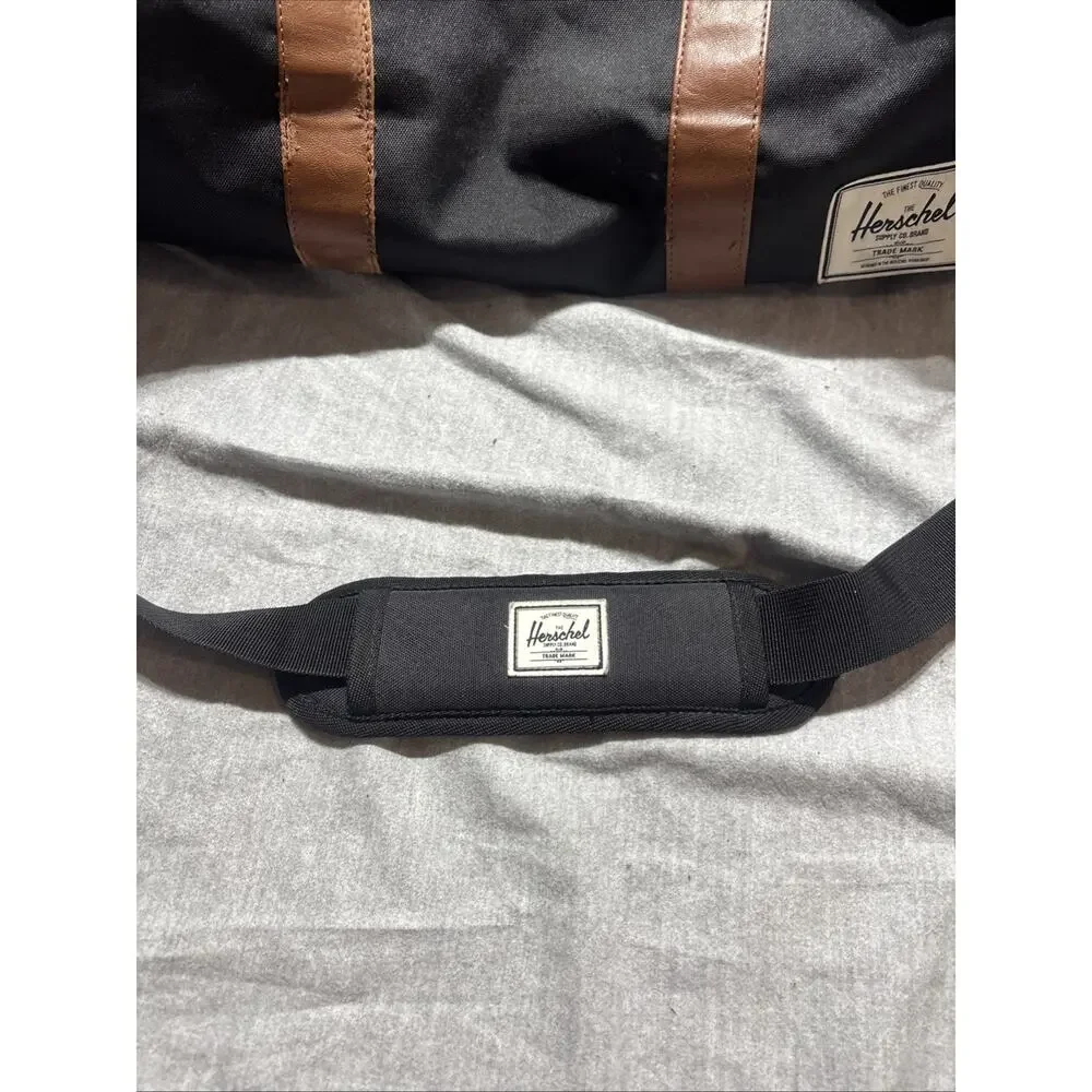 Herschel Supply Co. Novel Duffle Bag Black & Brown Leather With Shoulder Strap